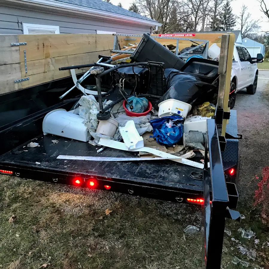 Roll-off dumpster delivered to a residential driveway in Waverly